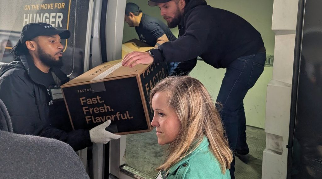 Issue donates refrigerated vans to Aurora meals pantries