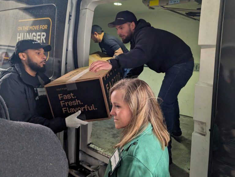 Issue donates refrigerated vans to Aurora meals pantries