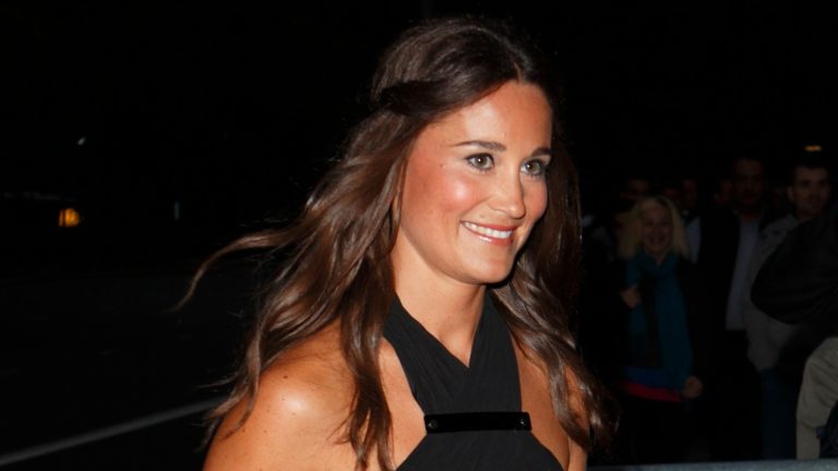 Pippa Middleton black halterneck and orange maxi skirt solved our summer time night put on dilemma