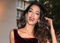Amal Clooney’s burgundy jumpsuit is a perfect wedding ceremony visitor outfit
