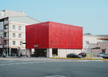 Pink steel panels surrounding a fiery facade for Taiwanese de Paperfarm restaurant