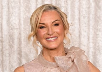 Gillian Taylforth’s blush pink jumpsuit is a complicated different to clothes