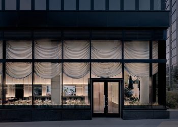 Curtains cowl the polycarbonate partitions within the Nin Hao restaurant in Brooklyn