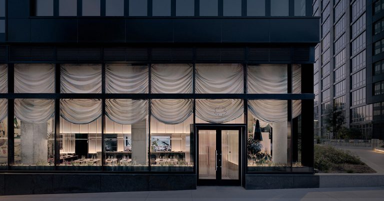 Curtains cowl the polycarbonate partitions within the Nin Hao restaurant in Brooklyn