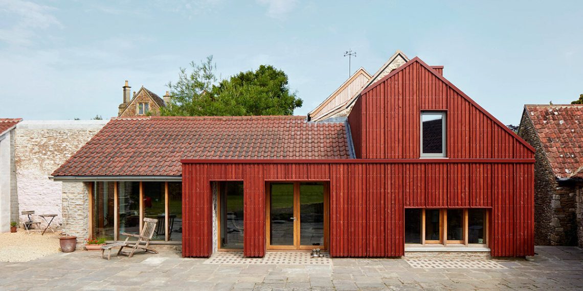 Tuckey Design Studio restores and expands the historic woolen room in Somerset