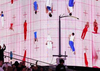 Skip Olympic gymnasts kind the takeover of Yuge Zhou Instances Sq.