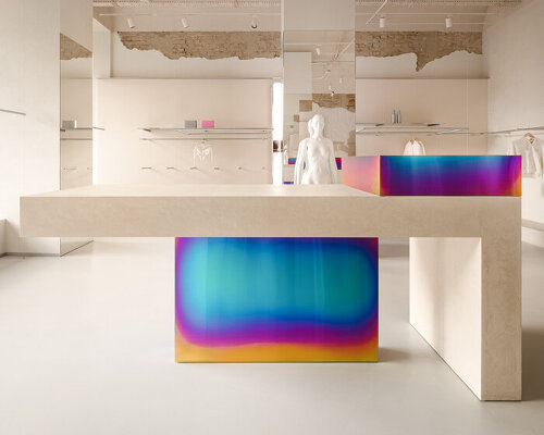 iridescent metal and textured plaster shape rikky hype showroom in kyiv